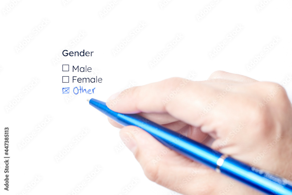 Hand writing and marking the handwritten option other in a gender form Hand writing and marking the handwritten option other in a gender form