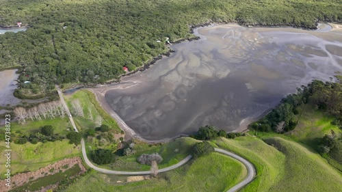 Bridge between Motutapu Island and volcanic Rangitoto Island. Coastal scenic landscape of New Zealand photo