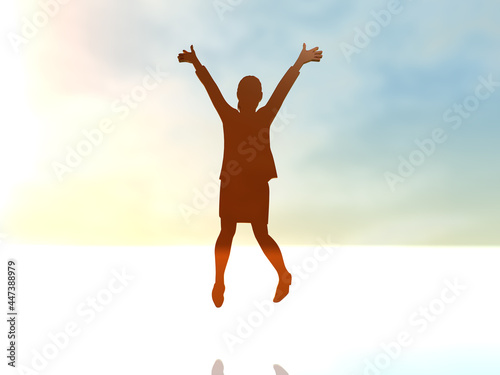 ジャンプして喜ぶ若者の女性シルエット