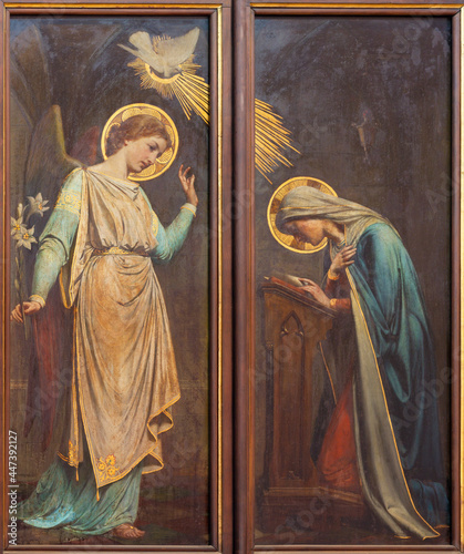 VIENNA, AUSTIRA - JUNI 24, 2021: The painting of Annunciation in the Votivkirche by Ernst Nowak (1851-1919). photo