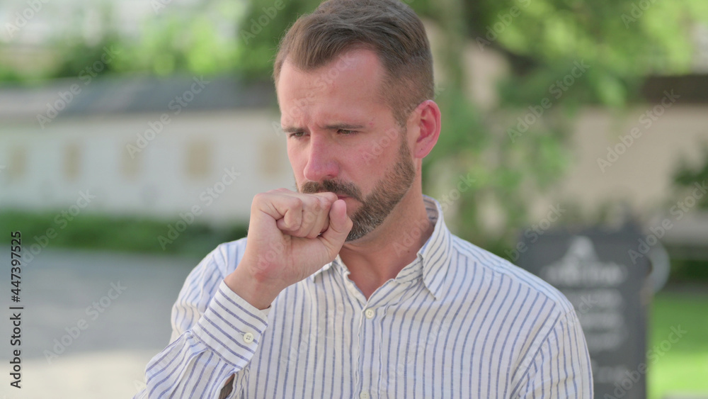 Outdoor Portrait of Mature Adult Man having Coughing Outdoor Portrait of Mature Adult Man having Coughing