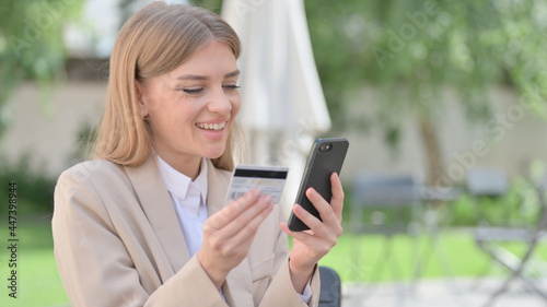 Outdoor Businesswoman Doing Online Shopping on Smartphone