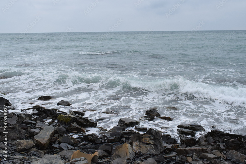 Beautiful seascape. Black Sea. Waves. Pebble beach.