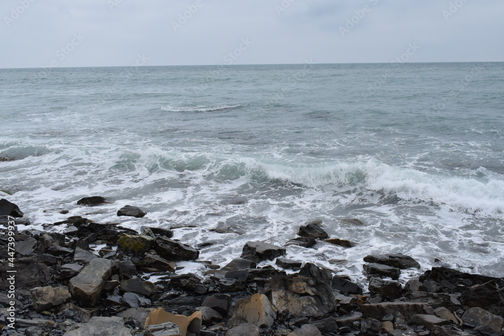 Beautiful seascape. Black Sea. Waves. Pebble beach. Beautiful seascape. Black Sea. Waves. Pebble beach.