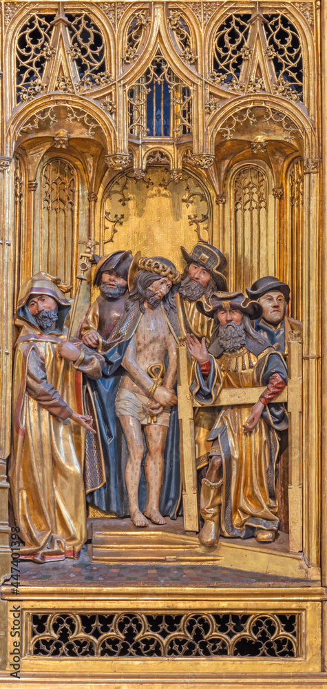 VIENNA, AUSTRIA - JULI 5, 2021: Jesus before Pilate panel as detail from gothic carved wings altar in Church of the Teutonic Order or Deutschordenkirche from year 1520 primarily from Mechelen.