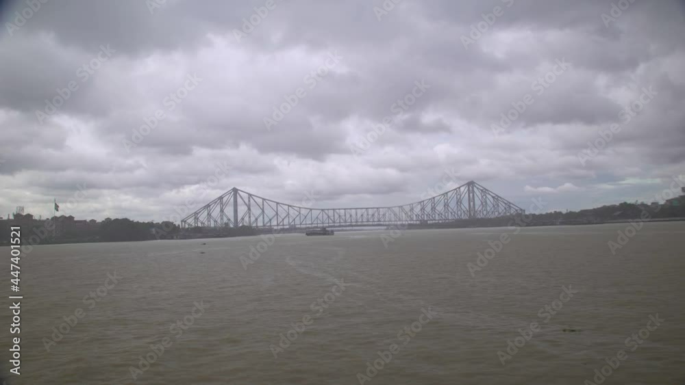 Howrah Bridge from Central Ganges River during rains