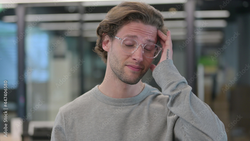 Portrait of Young Man having Headache Portrait of Young Man having Headache
