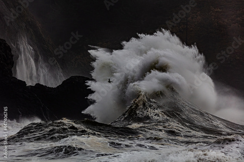 Thunderous waves over 40 feet tall crash into cliffs and rocks at Cape Disappointment, Washington when a King Tide. combine to create chaos and danger of unrivaled beauty.  
