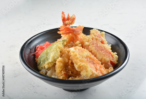 japanese deep fried tempura prawn and vegetables rice bowl in black bowl in white marble healthy poke bowl menu