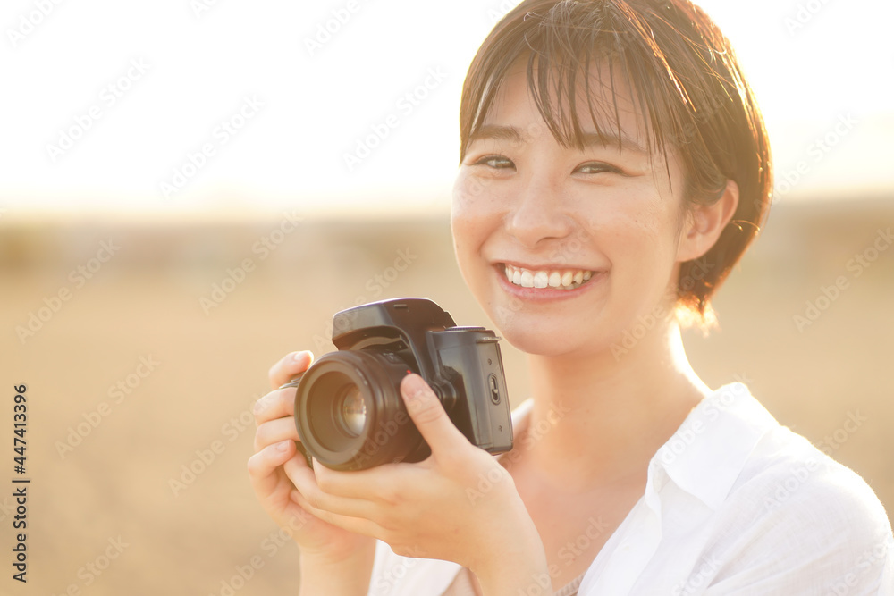 Fototapeta premium 写真を撮る女性