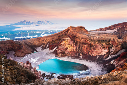 Lake in the crater of Gorely volcano in Kamchatka peninsula, Russia. Beautiful landscape at sunrise. photo