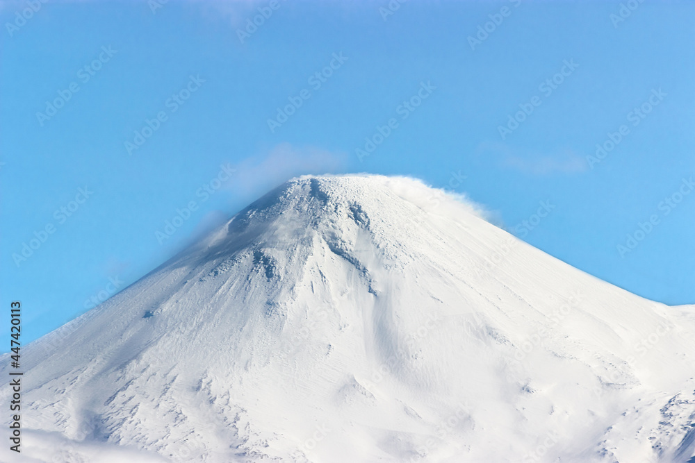 Kamchatka Peninsula. The top of the Avachinsky volcano in clear winter weather. The perfect weather for climbing. The natural park of Russia 