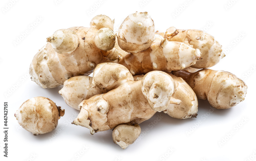 Jerusalem artichoke roots isolated on white background.