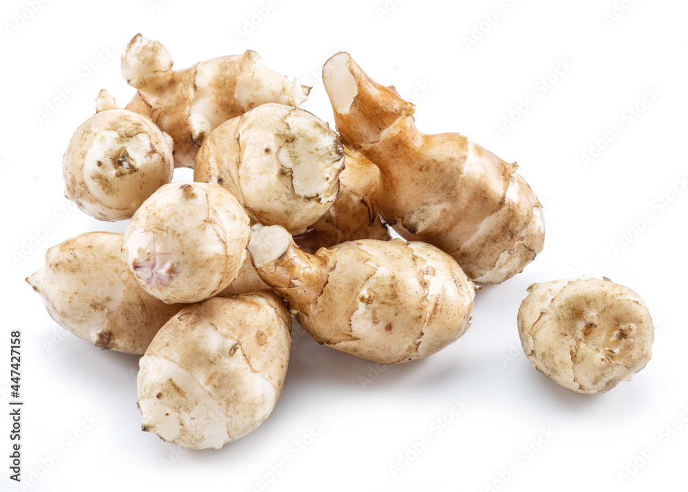 Jerusalem artichoke roots isolated on white background. Jerusalem artichoke roots isolated on white background.