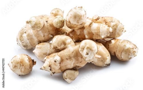 Jerusalem artichoke roots isolated on white background.