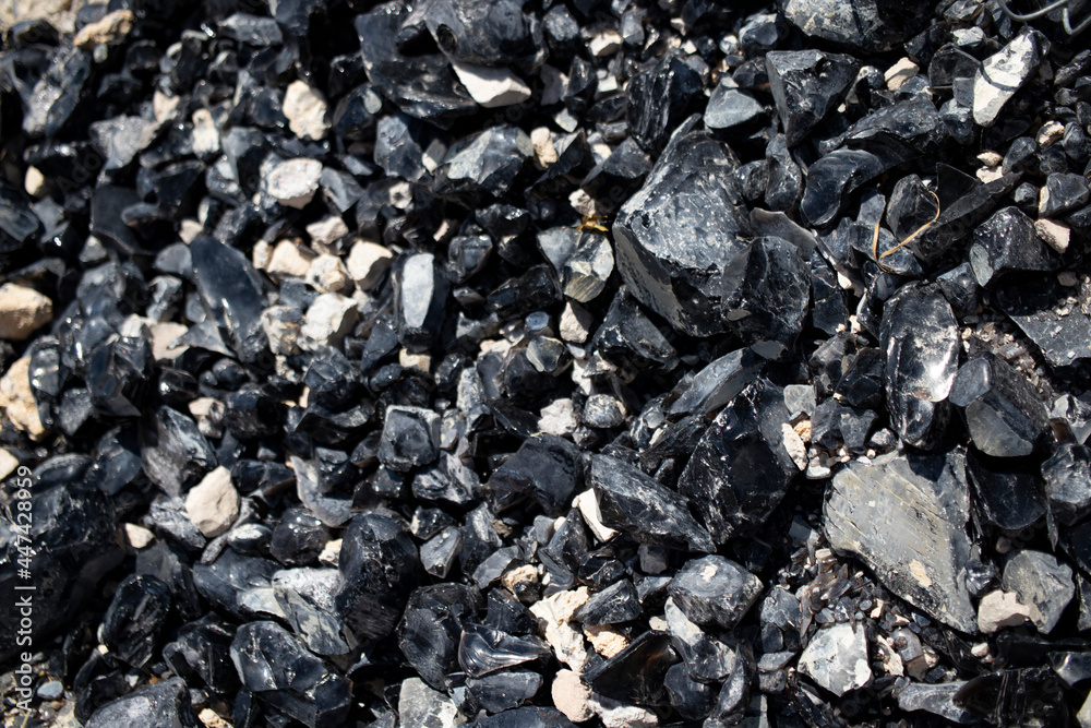 Obsidian stone mine, close-up. Obsidian stone mine, close-up.