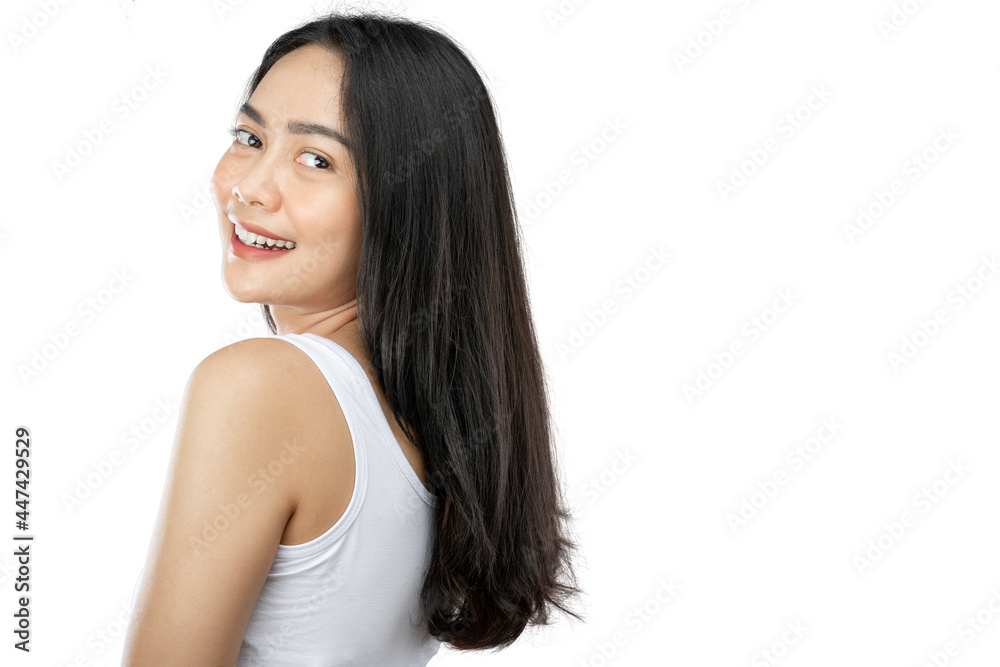 view side of attractive girl with long black hair with copy space on gray background view side of attractive girl with long black hair with copy space on gray background