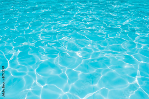 Beautiful ripple wave and blue water surface in swimming pool, Blue water for background and abstract