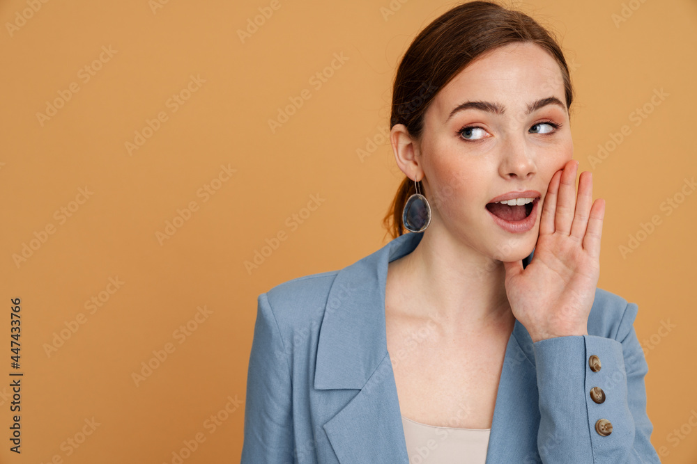 Young ginger woman in jacket gesturing and screaming aside Young ginger woman in jacket gesturing and screaming aside