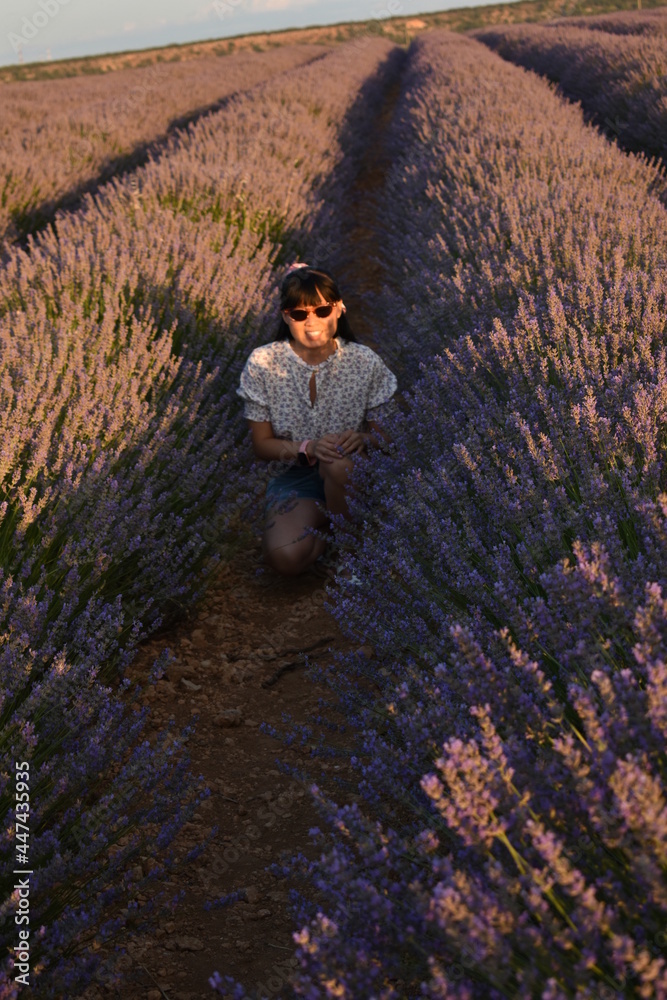 chinese girl surrounded by flowers