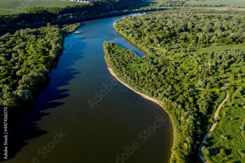 Stunning top view of the sinuous Dniester River. Summer landscape of the Dniester River. Picturesque photo wallpaper. Discover the beauty of earth