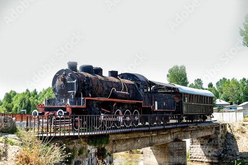 Two hundred years old train in muradiye district of van province. Turkey. locomotive in black color. photo