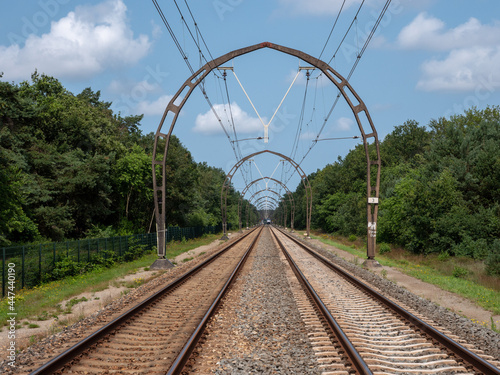 Railroad catenary portals in Hilversum, the Netherlands. National monument with cultural-historical and typological value