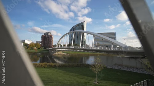 Main Street Bridge, Columbus, Oho USA. Revealing View Behind Fence on Sunny Day photo