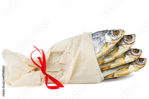 Bunch of dried white-eye bream (Ballerus sapa) fish isolated on a white background photo