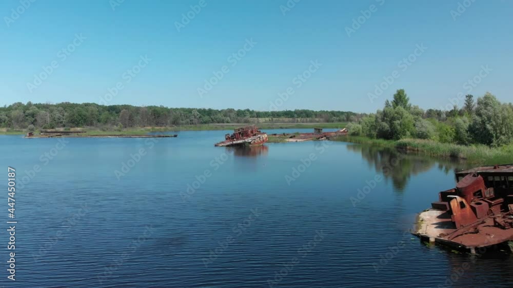 Abandoned porn on a river in Chernobyl with rusted ships Abandoned porn on a river in Chernobyl with rusted ships