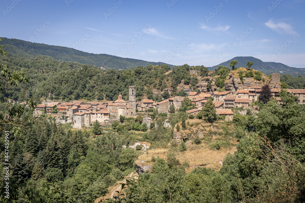 Fototapeta premium Medieval architecture street of Rupit Village in Catalonia, Osona. Aerial view. Medieval village among mountains.