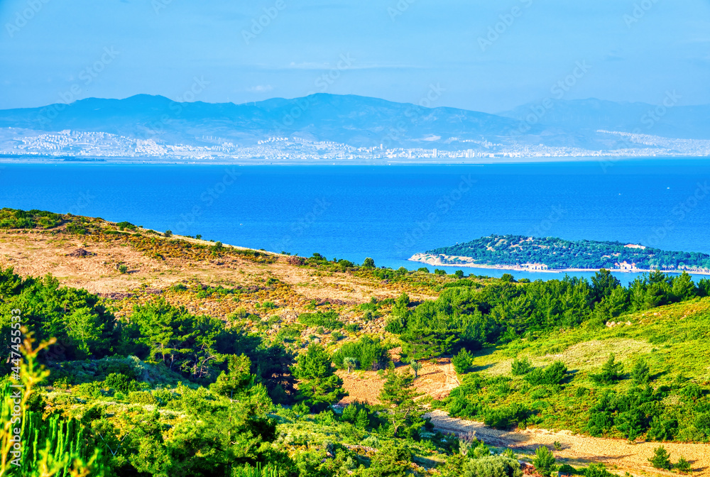 Panoramic view of Urla town, sea, sky, mountains and buildings in İzmir, Turkey