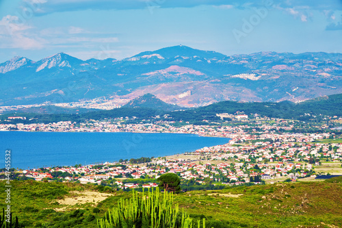 Panoramic view of Urla town, sea, sky, mountains and buildings in İzmir, Turkey