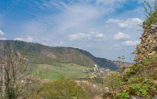 Gorgeous shot of vast hills near a small town under a bright sky in Rhineland-Palatine photo