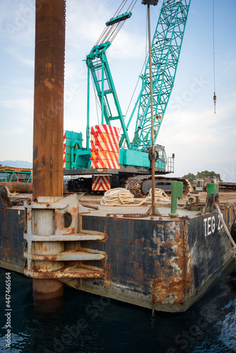 Construction platform with crane at a harbour