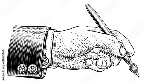 Hand In Business Suit Holding Artists Paintbrush