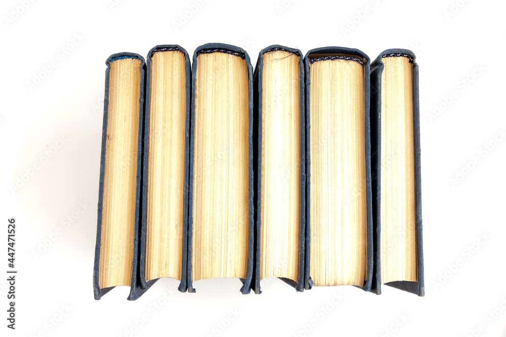 Old hardback books background. Top view. education background. Back to school. Copy space for text. Old hardback books background. Top view. education background. Back to school. Copy space for text.