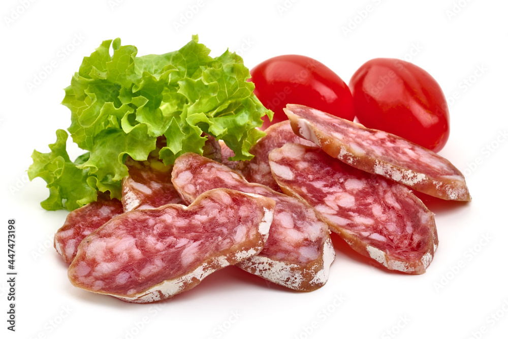 Spanish Fuet sausage slices, isolated on white background. High resolution image.