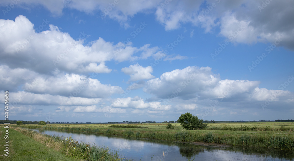Havelte Oude Vaart Drente Netherlands. Canal and meadows. Dutch landscapes. Clouds. Summer