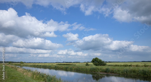 Havelte Oude Vaart Drente Netherlands. Canal and meadows. Dutch landscapes. Clouds. Summer