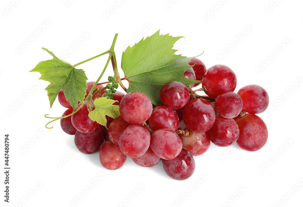 Fototapeta premium Cluster of ripe red grapes with green leaves on white background
