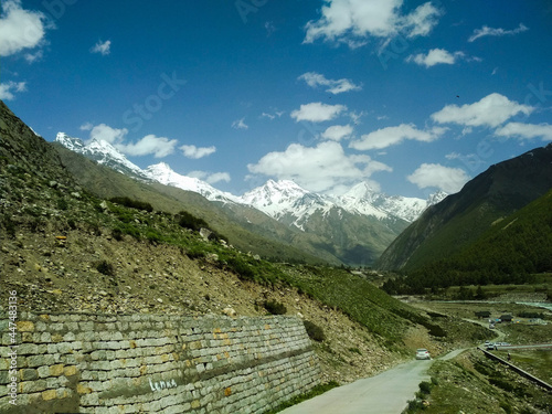 A Beautiful Shot of asphalt road to Baspa river in Chitkul village, Kinnaur valley, Himachal, India. photo