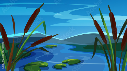 Landscape with reeds on background of mountains. Beautiful natural scenery.