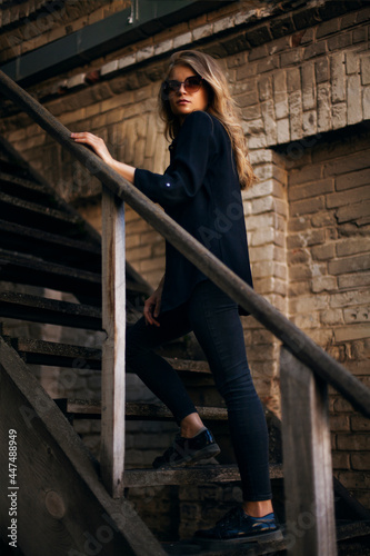Girl in black on the stairs © Artur Khasanov