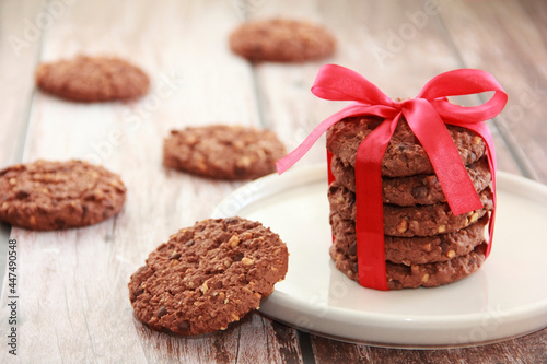 round oatmeal cookies with chocolate chips and nuts