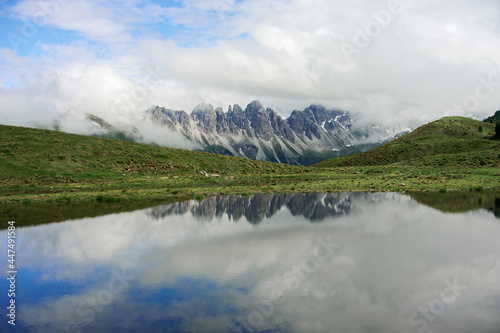 Mountain range is reflected in the lake