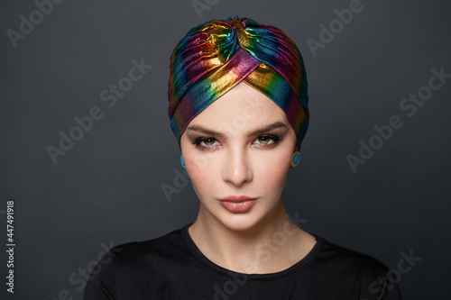 Obraz na plátně Glamour woman in a turban on black background
