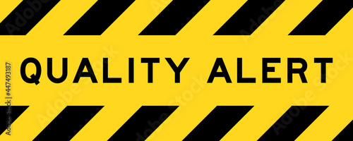 Yellow and black color with line striped label banner with word quality alert
