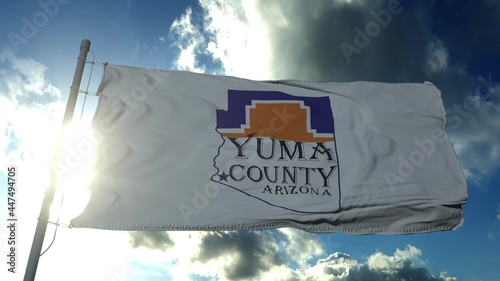 Yuma county flag, state of Arizona, United States of America waving at wind in blue sky. 3d rendering photo