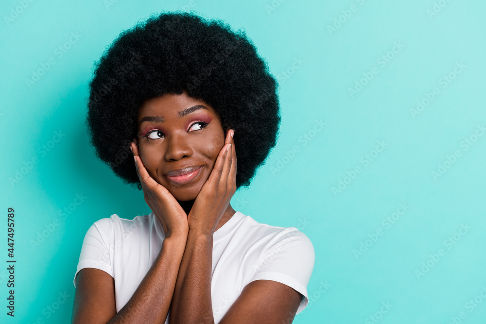 Photo of think short hairdo brunette millennial lady hands face look empty space wear white t-shirt isolated on cyan color background Photo of think short hairdo brunette millennial lady hands face look empty space wear white t-shirt isolated on cyan color background